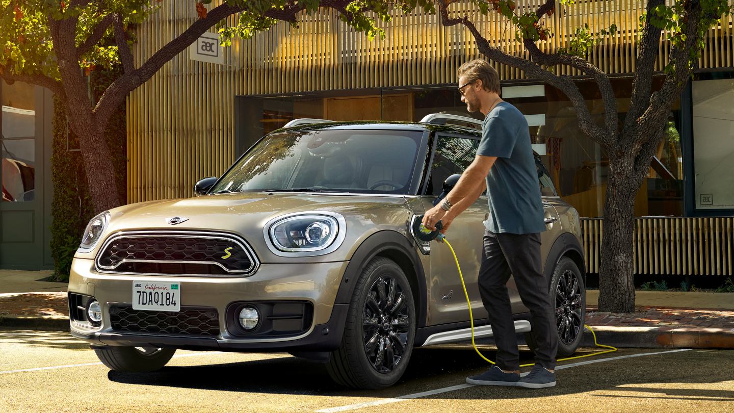 2019 Mini Cooper E Electric car at charging point front view uhd wallpaper
